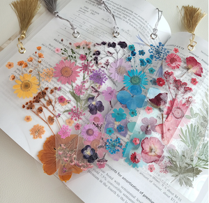 bookmarks made of pressed flowers between resin