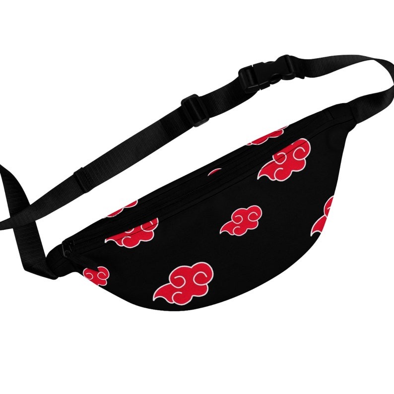 A black fanny pack with a pattern of stylized red clouds