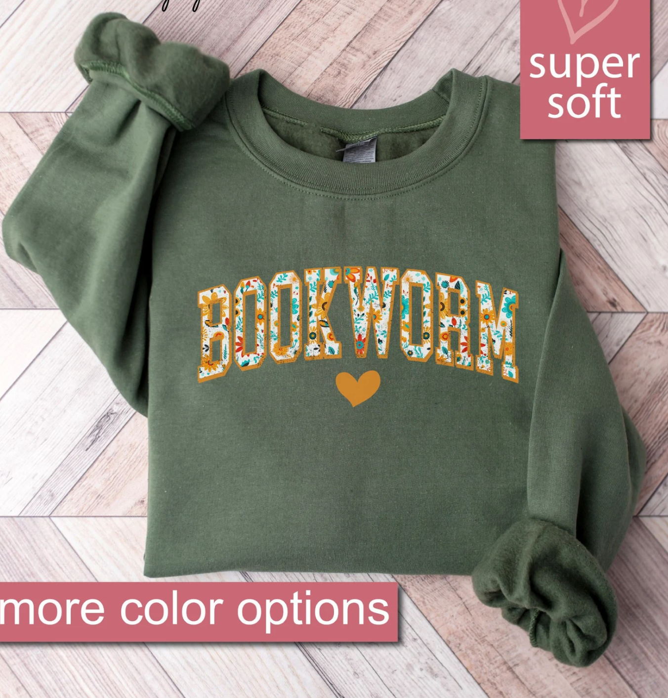 An Olive Green sweatshirt with a floral fabric embroidered into the word "Bookworm" on the front