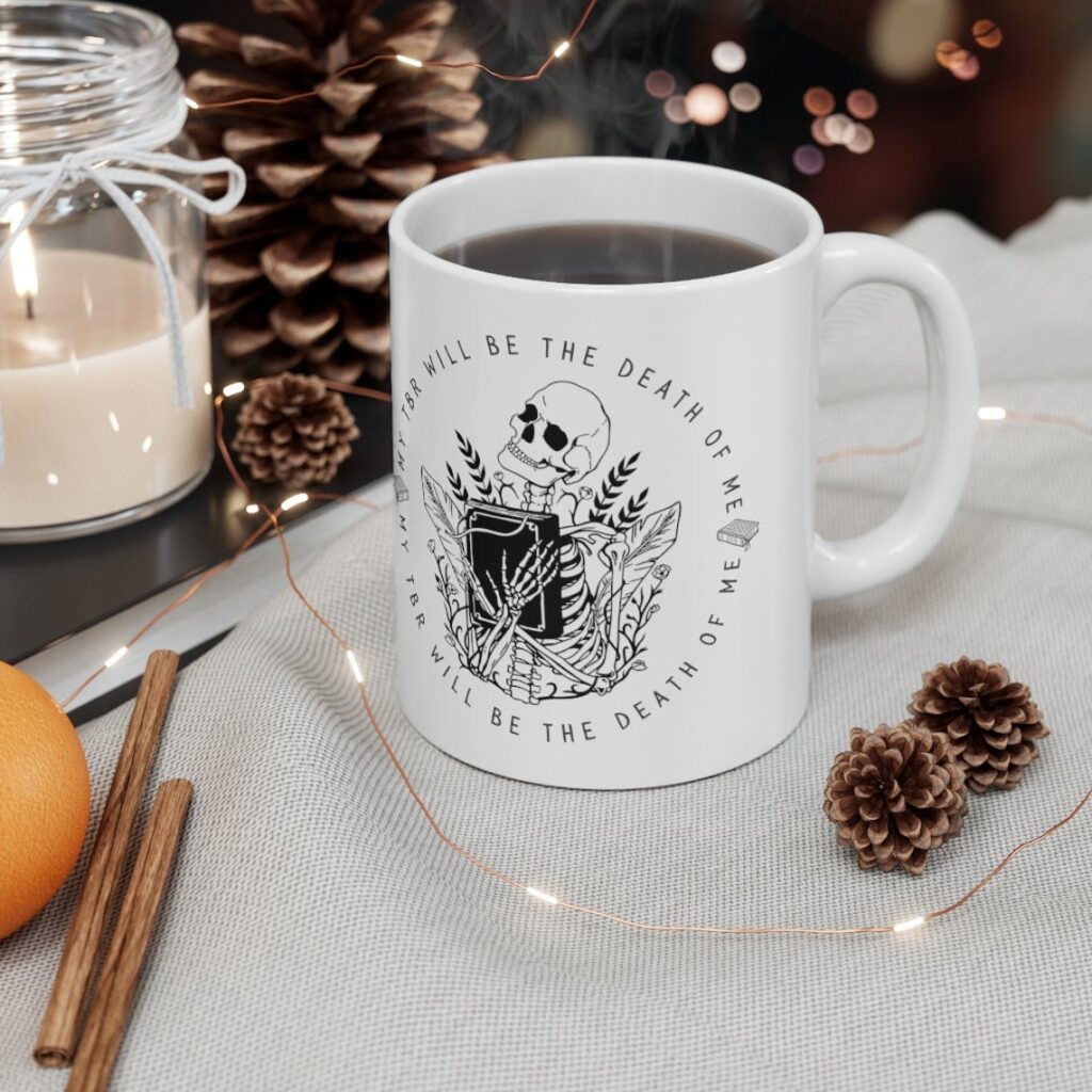 Mug with a skeleton hugging a book surrounded by the words my TBR will be the death of me 