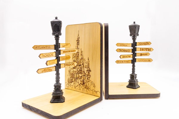 A set of bookends that feature lamposts with little direction signs on them, pointing toward locatins such as "Atlantis" and "Mordor"