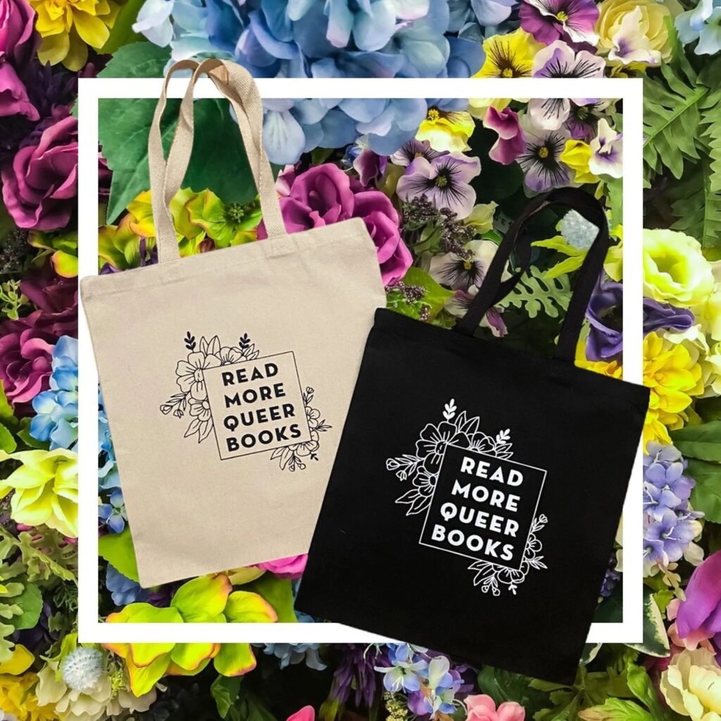 read more queer books tote bag with floral design