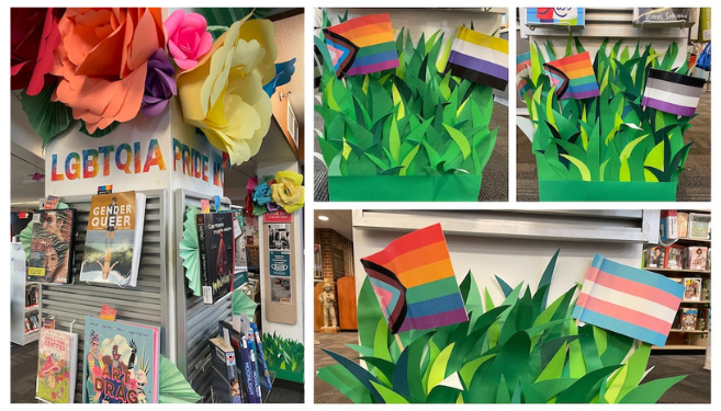 a photo of an LGBTQ book display on a column with large colorful paper flowers at the top and a photo collage of LGBTQ flags sticking out of grass made from construction paper